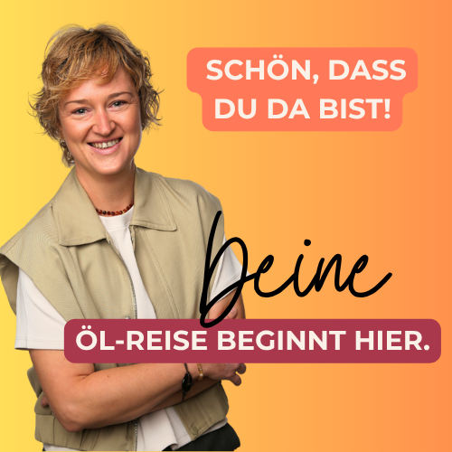 Eine Aromatherapie-Diffuser und verschiedene ätherische Öle auf einem Baumstumpf.